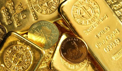 Markets: Gold down as traders eye Fed and trade talks
