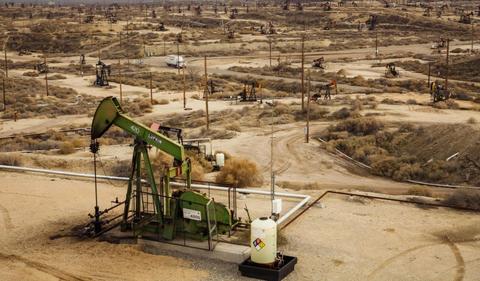 Oil rises on Venezuela sanctions, OPEC+ caps gains
