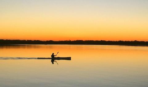 Markets: ASX 200 slips below record highs to close flat
