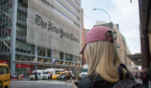 New York Times stock sinks amid subs drop, tech strike