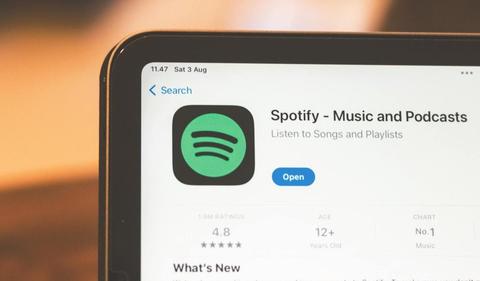 Spotify users, revenue up in first profitable year