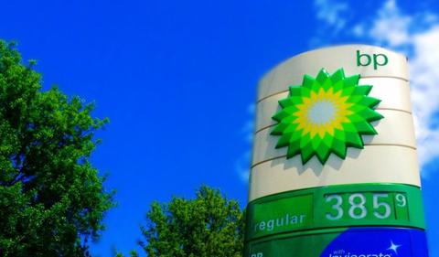 BP reports profit slump, pledges strategy overhaul