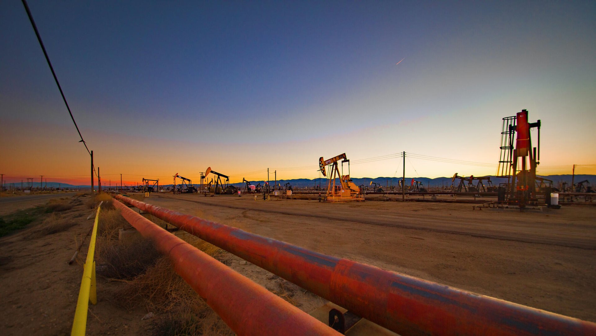 Oil ticks up on supply concerns; auto tariffs weighed