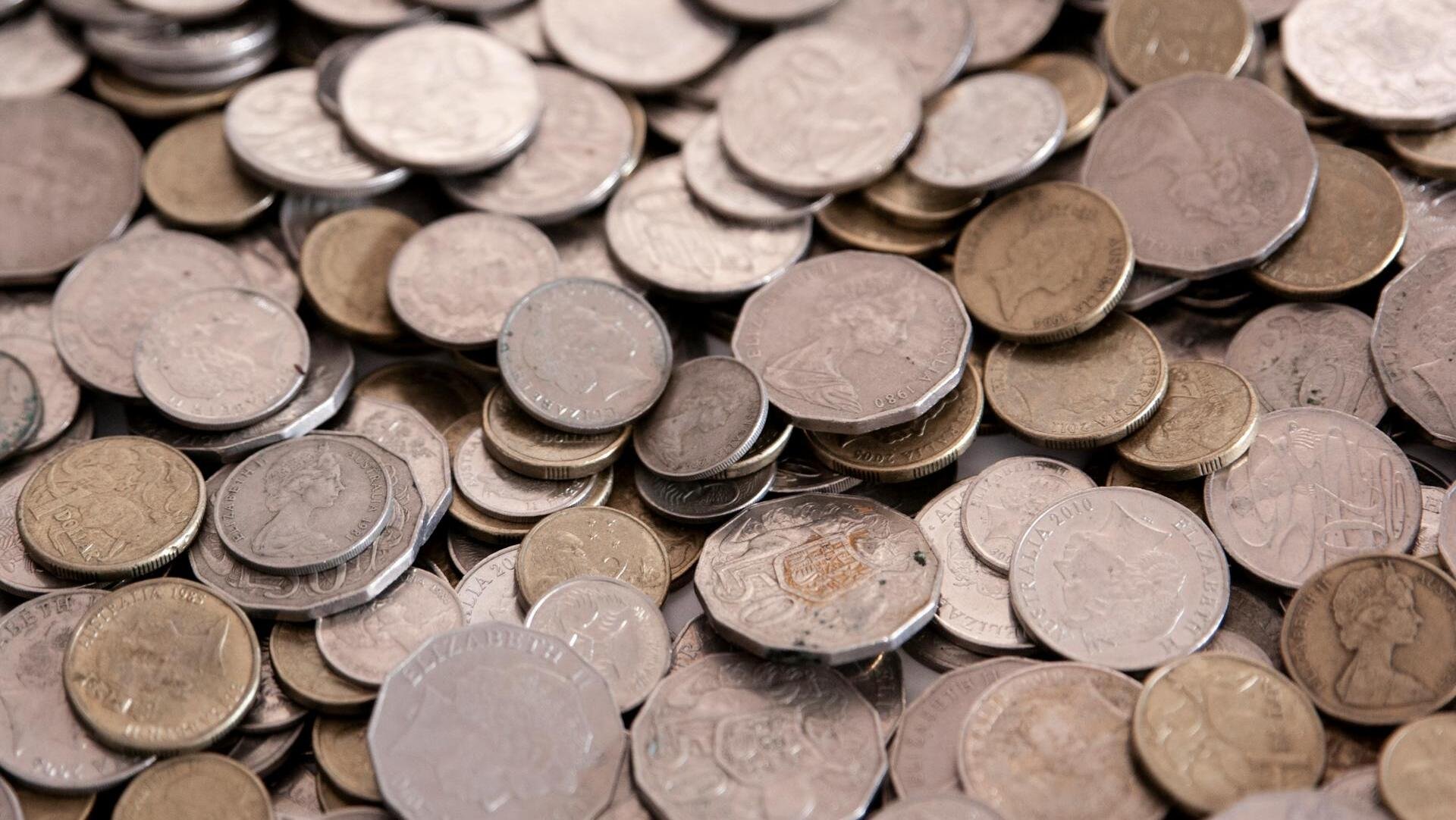 Most Australians want firms to accept cash: Money poll