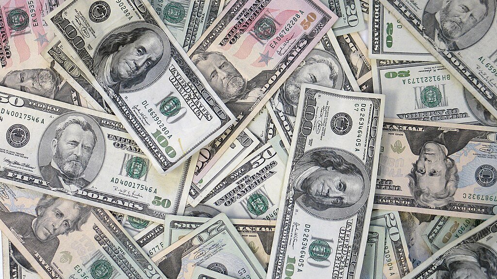 US dollar edges lower, yen surges ahead of Fed and BOJ meetings